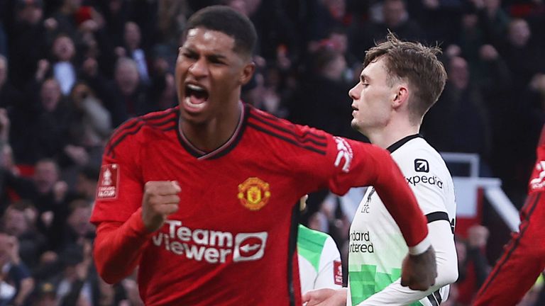 Marcus Rashford roars in celebration after scoring an extra-time equaliser against Liverpool