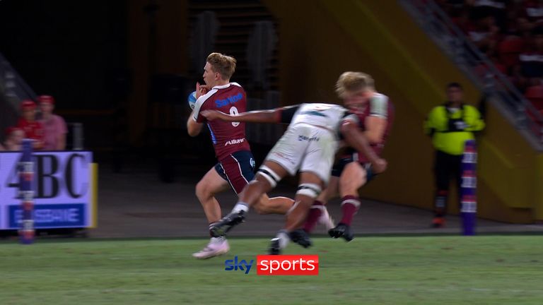 Samipeni Finau somehow escapes a card for his late tackle on Tom Lynagh during their game against Queensland Reds. 