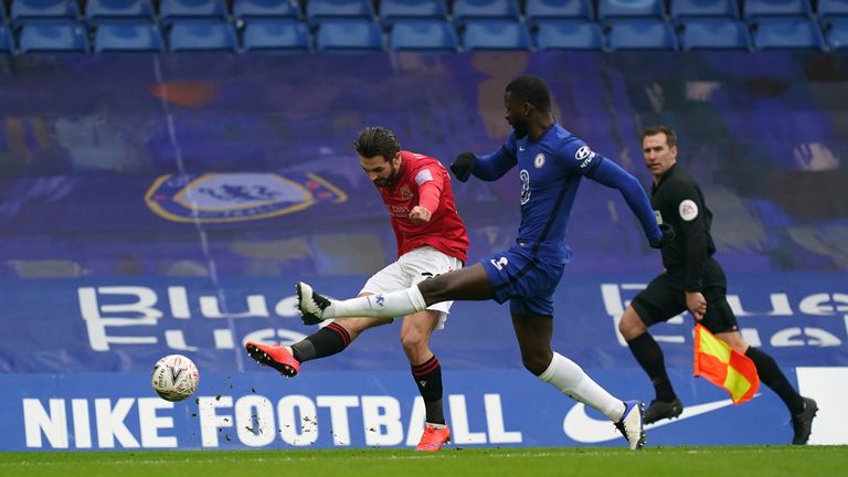 Chelsea's Antonio Rudiger attempts to block the cross from Morecambe's Adam Phillips during the Emirates FA Cup third round match at Stamford Bridge, London.