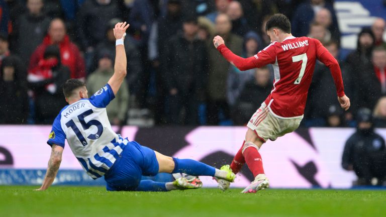 Jakub Moder escaped a red card for this tackle on Neco Williams