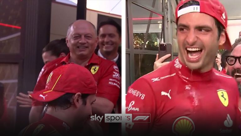 Ferrari team principal Fred Vissor celebrates with Carlos Sainz after winning the Australian GP