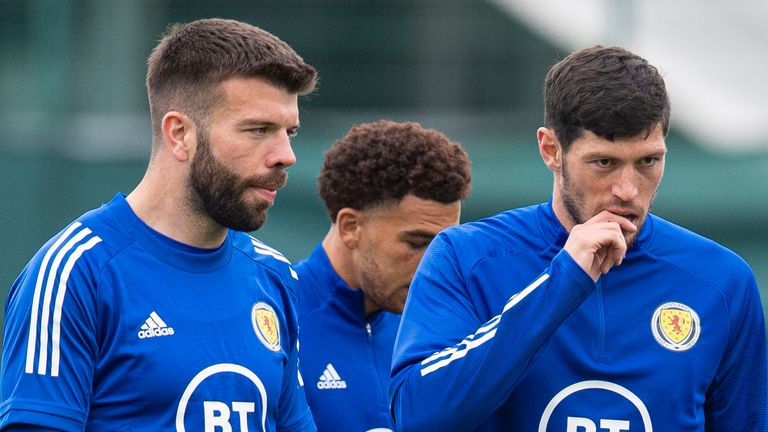Grant Hanley (left) and Scott McKenna (right) have both withdrawn from the Scotland squad due to injury