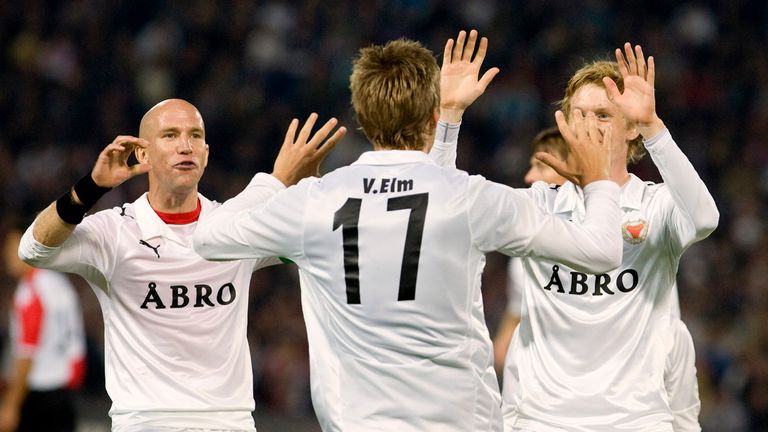 Kalmar's Viktor Elm, center, reacts after scoring a goal against Feyenoord with fellow team members Henrik Rydstrom, left, and Rasmus Elm, right, during the UEFA Cup soccer match at Stadium de Kuip in Rotterdam, Netherlands, Thursday, Sept. 18, 2008. 