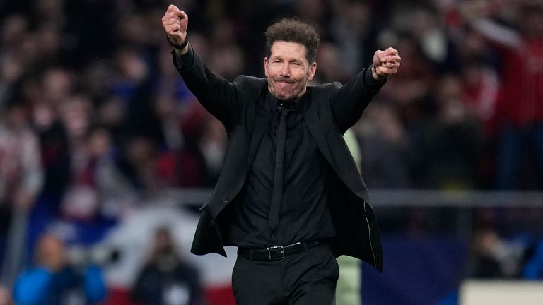 Atletico Madrid's head coach Diego Simeone celebrates at the end of the game