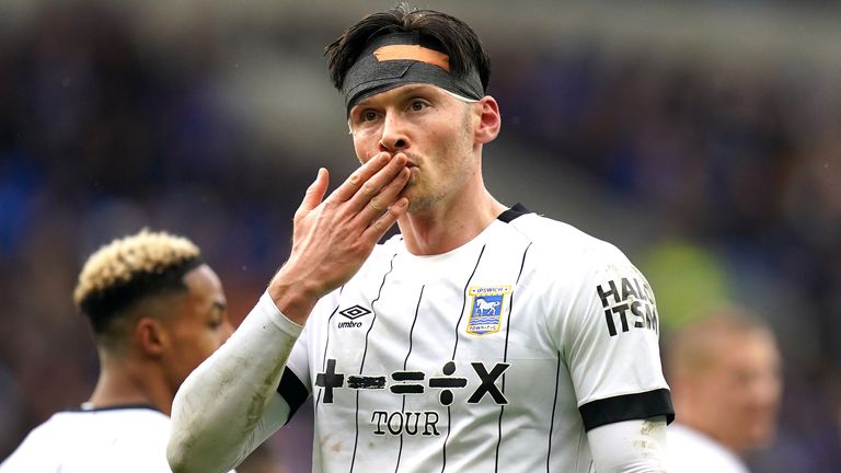 Kieffer Moore gestures towards the Ipswich fans after scoring the decider against former club Cardiff