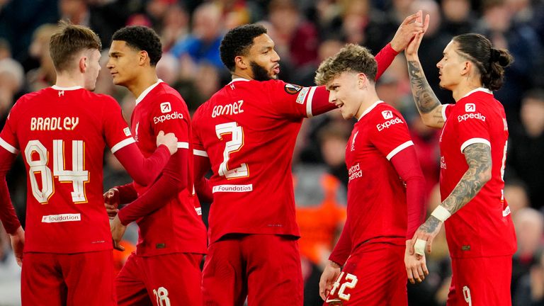 Liverpool players celebrate after Bobby Clark, 2nd right, scored their second goal during the Europa League round of 16, second leg, soccer match between Liverpool and Sparta Praha at Anfield Stadium, Liverpool, England, Thursday March 14, 2024. (AP Photo/Jon Super)