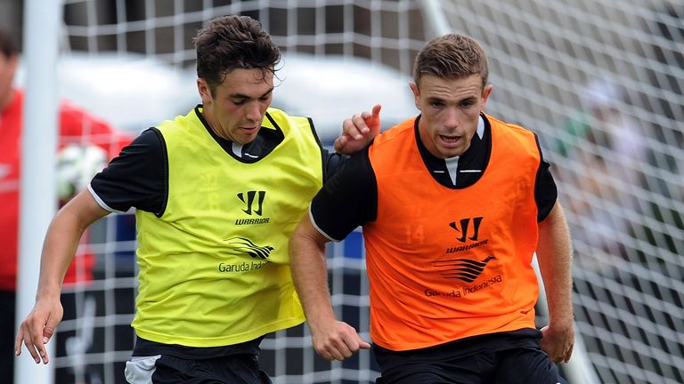 Adam Phillips and Jordan Henderson of Liverpool in action during a training session at Harvard University. 