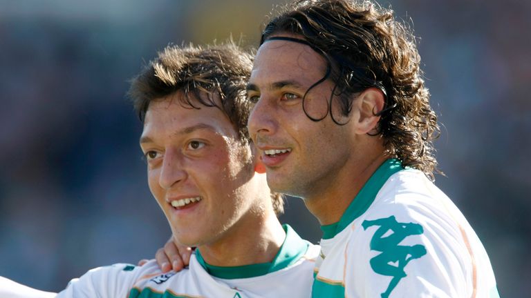 Bremen's Claudio Pizarro, right, and Mesut Oezil react after Bremen's second goal during the German first division Bundesliga soccer match between Werder Bremen and TSG 1899 Hoffenheim, northern Germany, Saturday, Sept. 27, 2008.