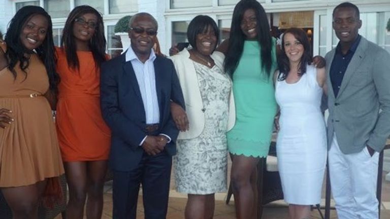 Nedum Onuoha (right), with his mum and dad (centre), wife and three sisters 

