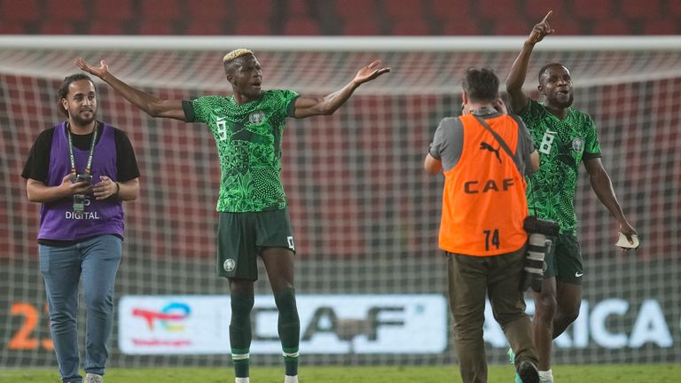 Nigeria's Victor Osimhen and Frank Onyeka celebrate after their AFCON semi-finals win over South Africa
