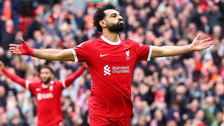 Mohamed Salah celebrates after giving Liverpool a 2-1 lead against Brighton