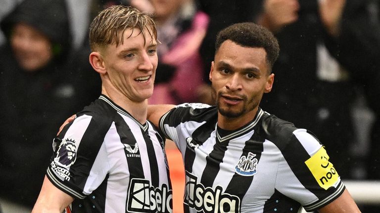Anthony Gordon celebrates after doubling Newcastle's lead against Wolves