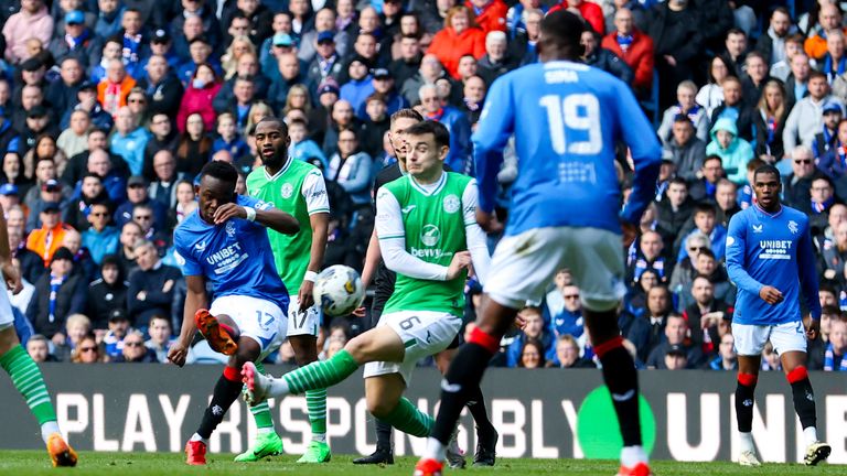 GLASGOW, SCOTLAND - MARCH 30: Rabbi Matondo scores to make it 3-1 Rangers during a cinch Premiership match between Rangers and Hibernian at Ibrox Stadium, on March 30, 2024, in Glasgow, Scotland.  (Photo by Craig Williamson / SNS Group)