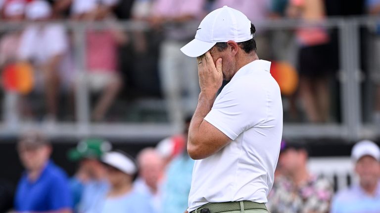 Rory McIlroy reacts after barely missing his putt on the 14th green during the first round of the Arnold Palmer Invitational (AP Photo/Phelan M. Ebenhack)