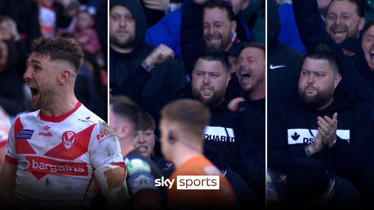 Michael Smith otherwise known in the world of the darts as Bully Boy is spotted in the crowd lapping up the atmosphere and celebrating an outrageous try from St Helens&#39; Tommy Makinson. 