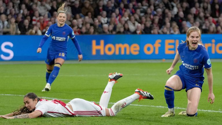 Chelsea's Sjoeke Nuksen, right, celebrates after scoring her side's second goal during the Women's Champions League quarterfinal soccer match between Ajax and Chelsea at the Johan Cruyff ArenA, in Amsterdam, Netherlands, Tuesday, March 19, 2024. (AP Photo/Peter Dejong)