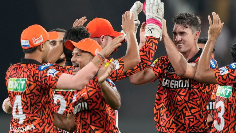 Sunrisers Hyderabad's captain Pat Cummins, right without cap, celebrates with teammates after the dismissal of Mumbai Indians' Rohit Sharma during the Indian Premier League cricket tournament between Sunrisers Hyderabad and Mumbai Indians in Hyderabad, India, Wednesday, March 27, 2024.(AP Photo/Mahesh Kumar A.)