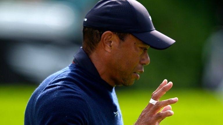 Tiger Woods acknowledges the gallery after finishing on the sixth green during the second round of the Genesis Invitational golf tournament at Riviera Country Club Friday, Feb. 16, 2024, in the Pacific Palisades area of Los Angeles. (AP Photo/Ryan Sun)