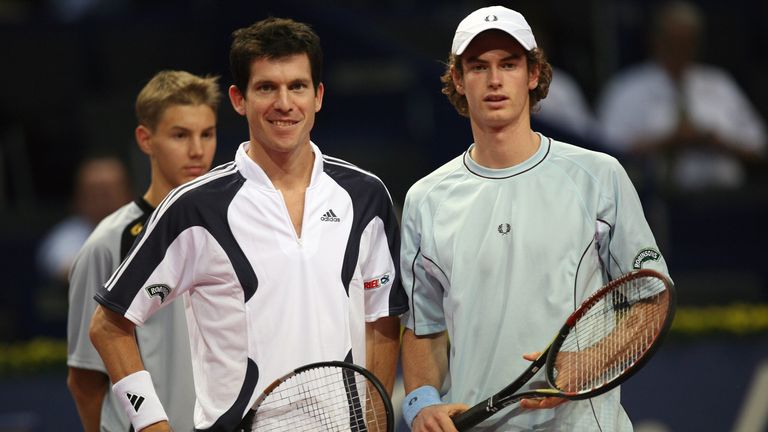 Tim Henman, left, and Andy Murray pose for the photographers prior to their first round match at the Swiss Indoors tennis tournament in Basel, Switzerland, Wednesday, Oct 26, 2005. (AP Photo/Keystone, Markus Stuecklin)