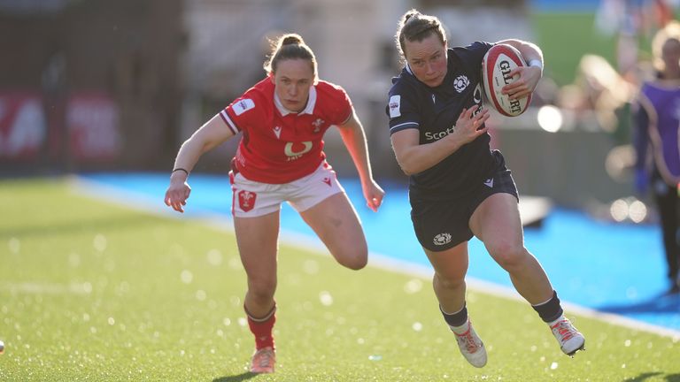 Scotlands Coreen Grant gets past Wales Jenny Hesketh