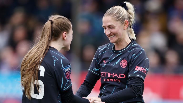 Laura Coombs celebrates after scoring Man City's fourth goal at Brighton