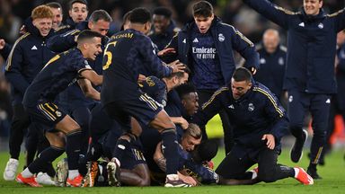 Antonio Rudiger is mobbed by his team-mates after scoring Real Madrid's winning penalty against Man City