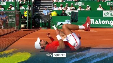 Djokovic catches his foot on clay and takes a tumble!