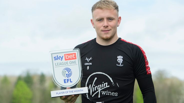 Lincoln City's Joe Taylor, photographed at the club...s BMW Soper of Lincoln Elite Performance Centre, with the Sky Bet League One Player of the Month trophy for March 2024...Picture: Chris Vaughan Photography for Lincoln City FC.Date: April 11, 2024