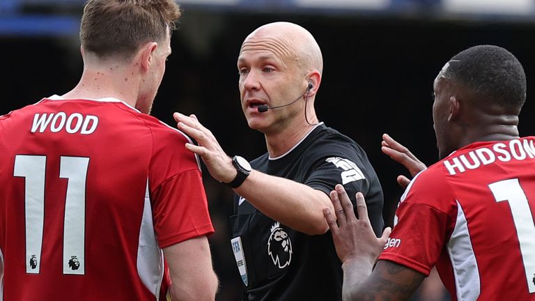 Anthony Taylor waved away three Nottingham Forest penalty appeals