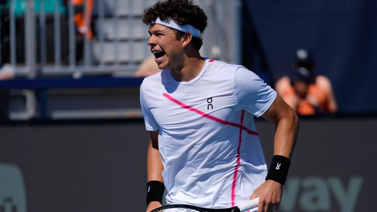 Ben Shelton shouts as he wins a point against Martin Landaluce, of Spain, in their men's second round match at the Miami Open tennis tournament, Sunday, March 24, 2024, in Miami Gardens, Fla. (AP Photo/Rebecca Blackwell)