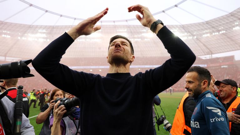 Xabi Alonso celebrates after Bayer Leverkusen clinch their first Bundesliga title