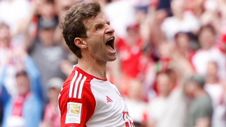 Thomas Muller celebrates after scoring Bayern Munich's second goal against Cologne
