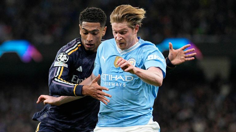 Kevin De Bruyne tangles with Jude Bellingham