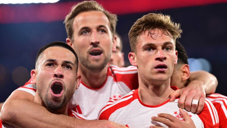 Joshua Kimmich celebrates with his team-mates after scoring against Arsenal