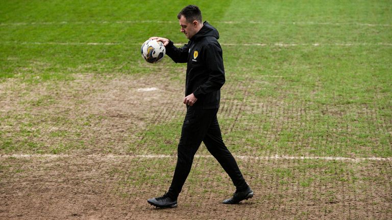 DUNDEE, SCOTLAND - APRIL 10: Referee Don Robertson during a pitch inspection ahead of a cinch Premiership match between Dundee and Rangers at the Scot Foam Stadium at Dens Park, on April 10, 2024, in Dundee, Scotland. (Photo by Ewan Bootman / SNS Group)