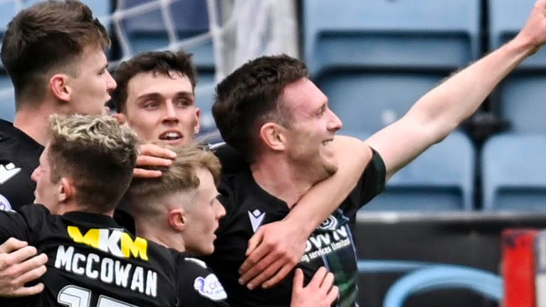 DUNDEE, SCOTLAND - APRIL 06: Dundee's Jordan McGhee celebrates scoring to make it 1-0 with his teammates during a cinch Premiership match between Dundee and Motherwell at the Scot Foam Stadium at Dens Park, on April 06, 2024, in Dundee, Scotland. (Photo by Rob Casey / SNS Group)