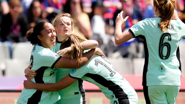 Chelsea's Erin Cuthbert celebrates with her team-mates after scoring the opening goal against Barcelona