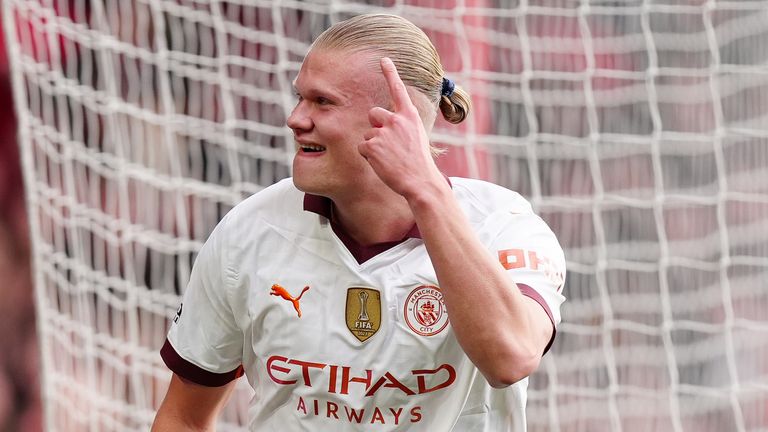 Erling Haaland celebrates his goal off the bench