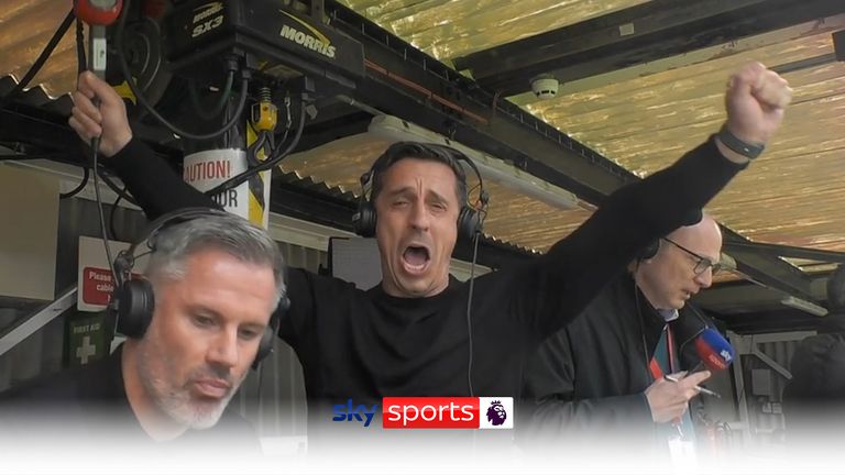 Gary Neville cheers a Manchester United goal against Liverpool.