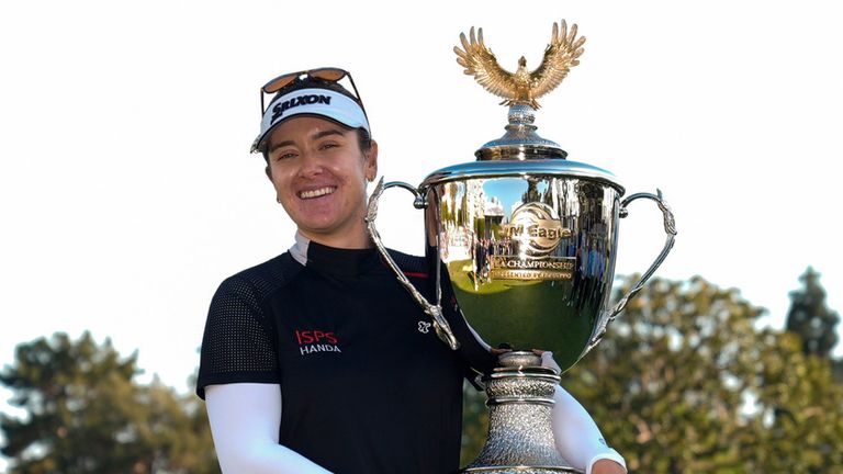 Hannah Green holds up the championship trophy after winning the LPGA's JM Eagle LA Championship golf tournament 