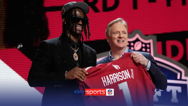 Ohio State wide receiver Marvin Harrison Jr. poses with NFL commissioner Roger Goodell after being selected by the Arizona Cardinals with the fourth overall pick in the first round of the NFL football draft, Thursday, April 25, 2024, in Detroit.