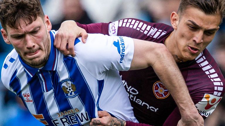 KILMARNOCK, SCOTLAND - APRIL 27: Kilmarnock's Joe Wright and Hearts' Kenneth Vargas in action during a cinch Premiership match between Kilmarnock and Heart of Midlothain at Rugby Park, on April 27, 2024, in Kilmarnock, Scotland.  (Photo by Craig Foy / SNS Group)