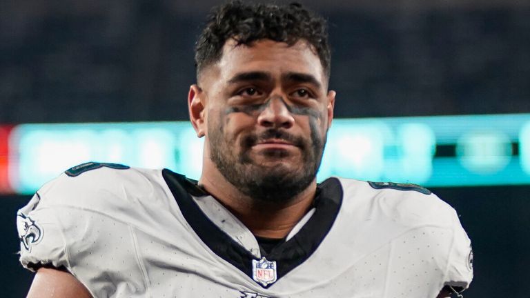 FILE - Philadelphia Eagles offensive tackle Jordan Mailata wlaks after an NFL football game against the New York Giants in East Rutherford, Sunday, Jan. 8, 2024. The NFL will expand its international search for talent by opening an academy in rugby-mad Australia. Ahead with the NFL Draft, the announcement says the region is full of talent the likes of Philadelphia Eagles offensive tackle Jordan Mailata, a 6-foot-8 Australian who was deemed too big for rugby. (AP Photo/Bryan Woolston, File)