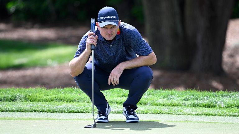 Justin Rose, of England, lines up his putt on the first green during the second round of the Arnold Palmer Invitational golf tournament, Friday, March 8, 2024, in Orlando, Fla. (AP Photo/Phelan M. Ebenhack)