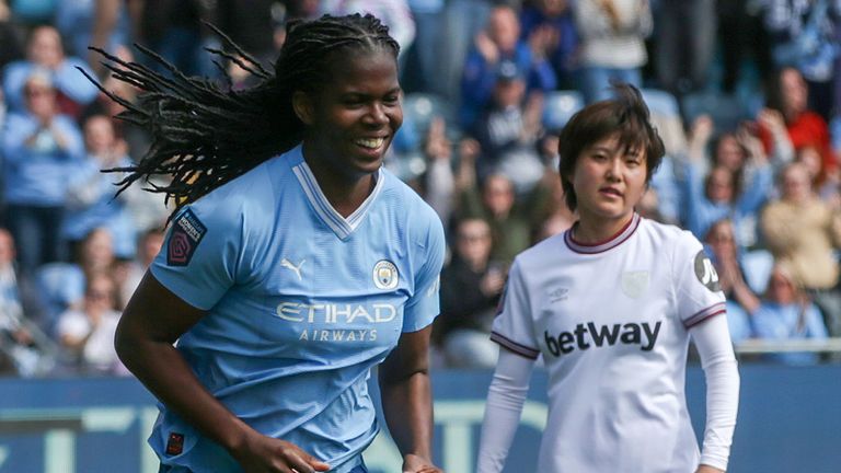 Khadija Shaw celebrates scoring Man City's third goal