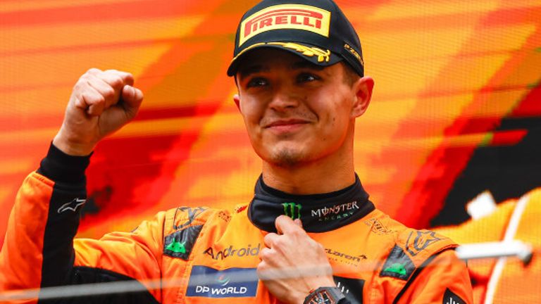 SHANGHAI INTERNATIONAL CIRCUIT, CHINA - APRIL 21: Lando Norris, McLaren F1 Team, 2nd position, celebrates on the podium during the Chinese GP at Shanghai International Circuit on Sunday April 21, 2024 in Shanghai, China. (Photo by Andy Hone / LAT Images)