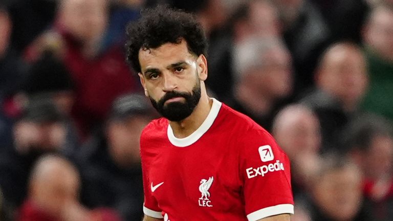 Liverpool's Mohamed Salah appears dejected after Atalanta's Gianluca Scamacca scores his second goal at Anfield