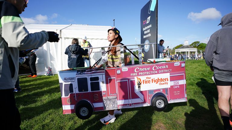 A competitor dressed as a fire engine in Blackheath before the TCS London Marathon