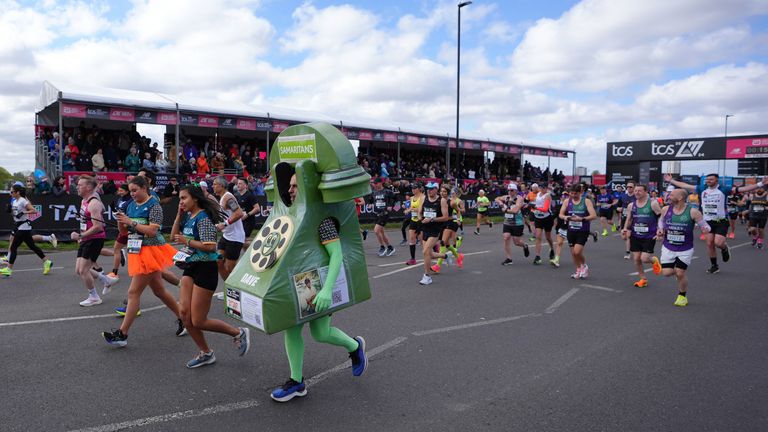A man was pictured was dressed as a telephone running the race too