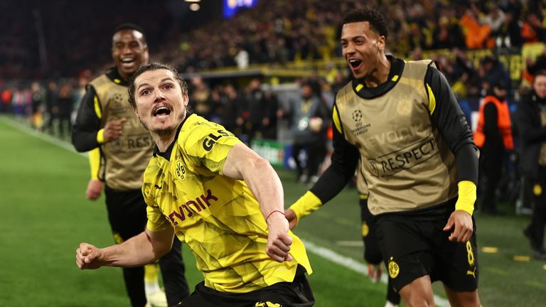 Dortmund edge Atletico in thriller to set up PSG semi-final